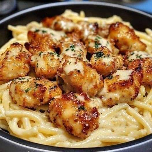 Golden Garlic Chicken Bites over Creamy Parmesan Pasta